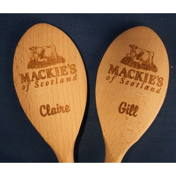 Wooden spoon engraved with company logo or phrase